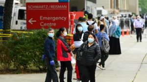 Canadian provinces cut COVID isolation for those vaccinated