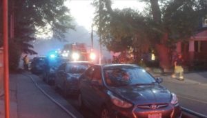 Firefighters try to douse fires at three homes on Vine Avenue