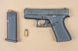 Two men charged in Brampton for trying to flee police, two handgun seized
